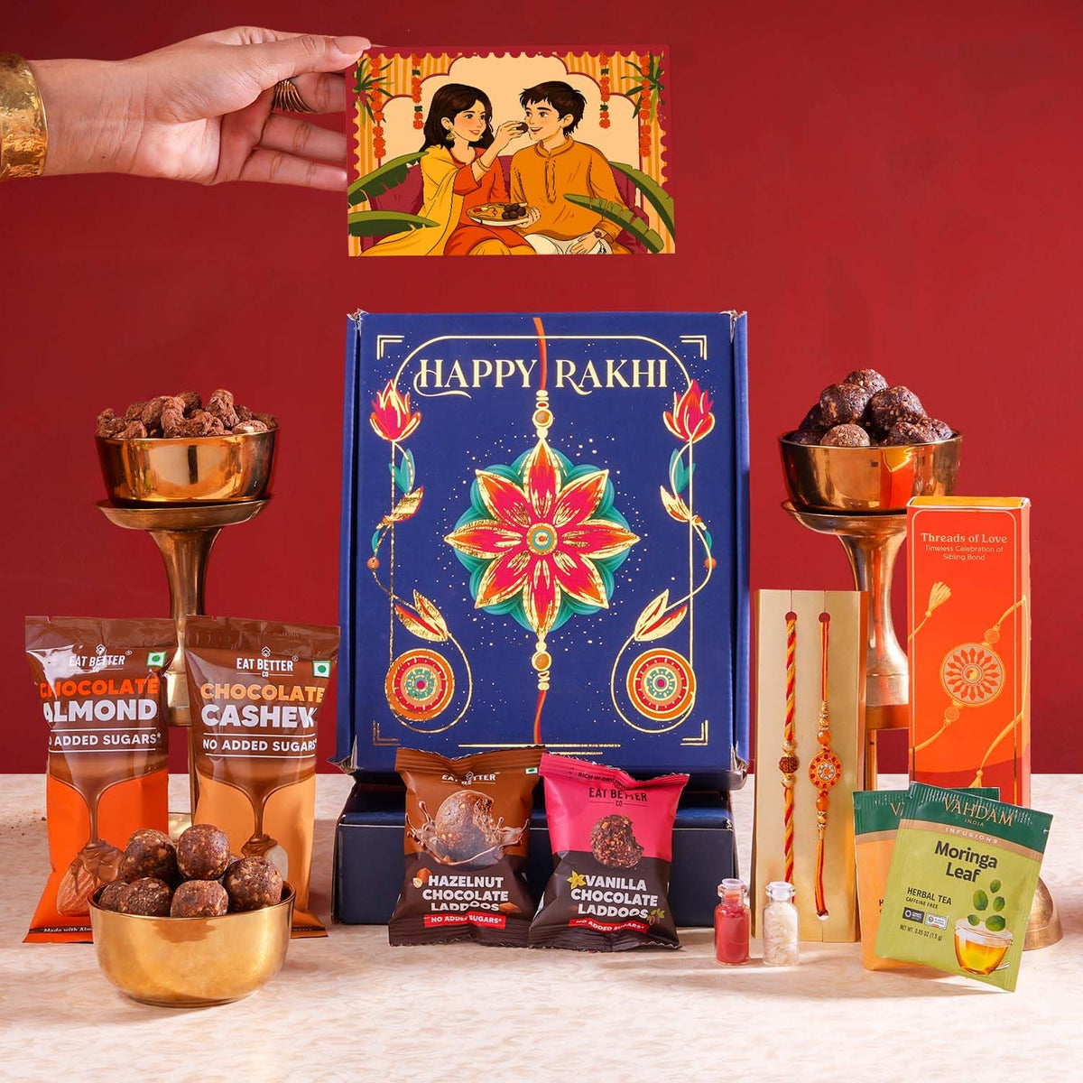 Bandhan - 10-Item Rakhi Gift Hamper for brother with set of 2 Premium Rakhis, Chocolate Coated Cashews & Almonds, Hazelnut Dry-Fruit Laddoos | Rakhi for Brother with Gift Combo Set by Eat Better Co