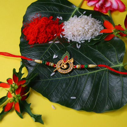 DeoDap Designer Murli Flute Rakhi for Brother with Choco Coated Nut Butterscotch Chocolate 96gm, Pooja Coin, Roli Chawal & Card | Rakhi with Chocolate Combo for Raksha Bandhan